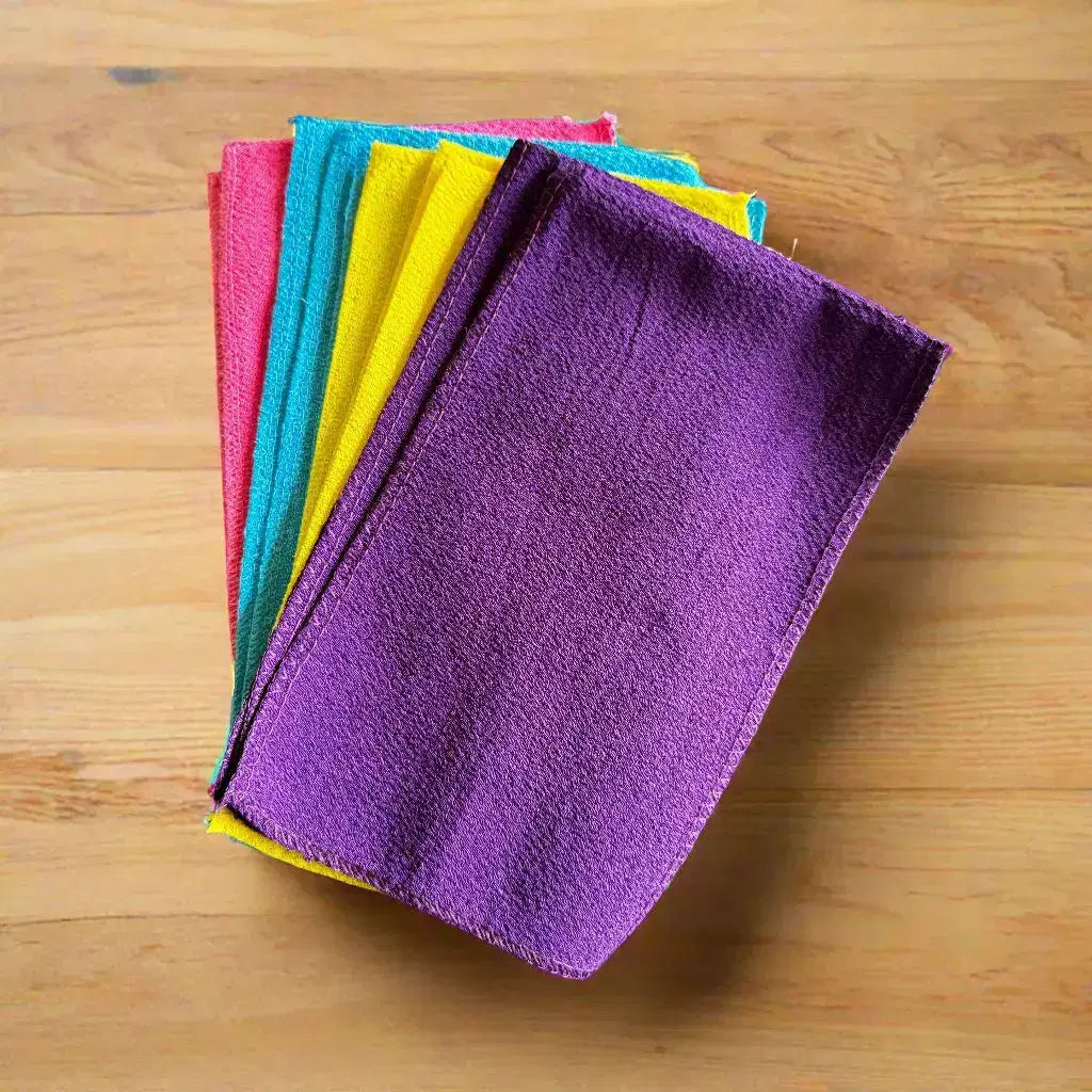 pink, blue, yellow purple scrub cloths