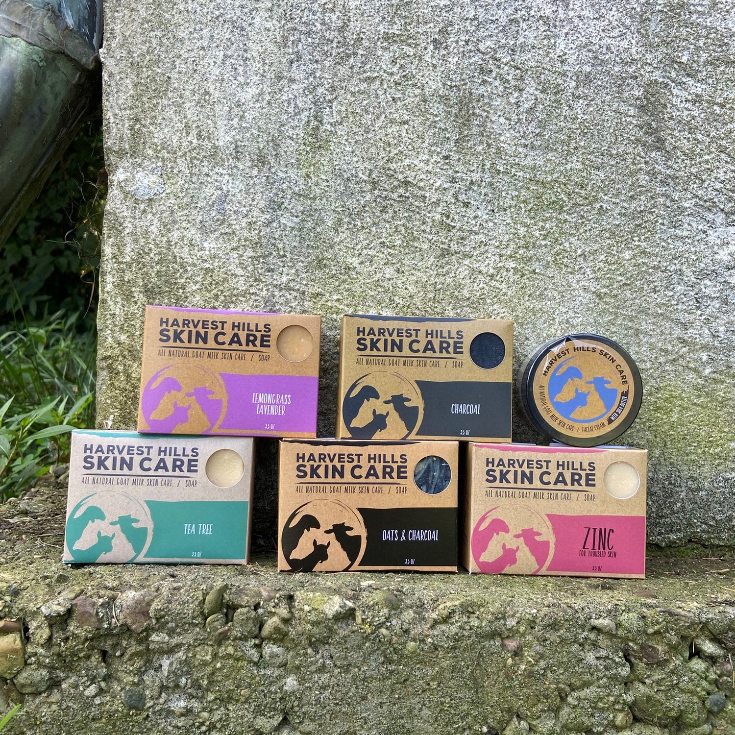 Six different soaps on a rock