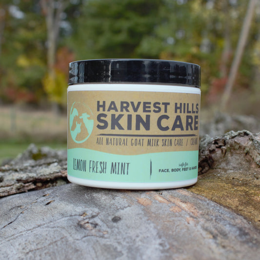 Harvest Hills Skin Care moisturizer jar on a wooden surface with a natural background