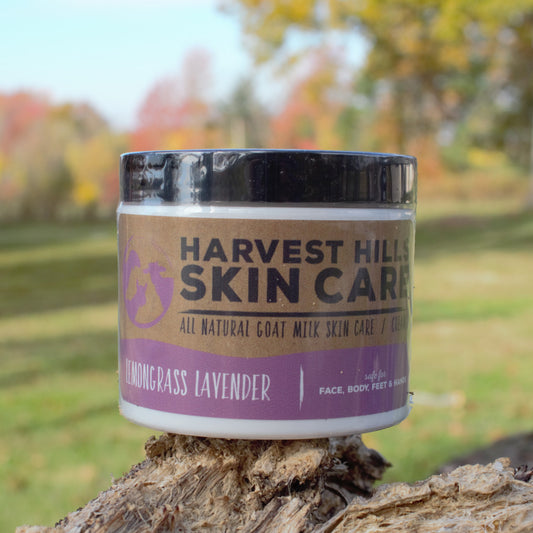 Jar of goat milk moisturizer with blurred background