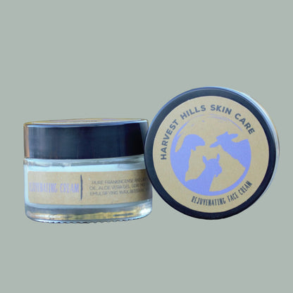 Jar of Harvest Hills Skin Care rejuvenating face cream on a gray background
